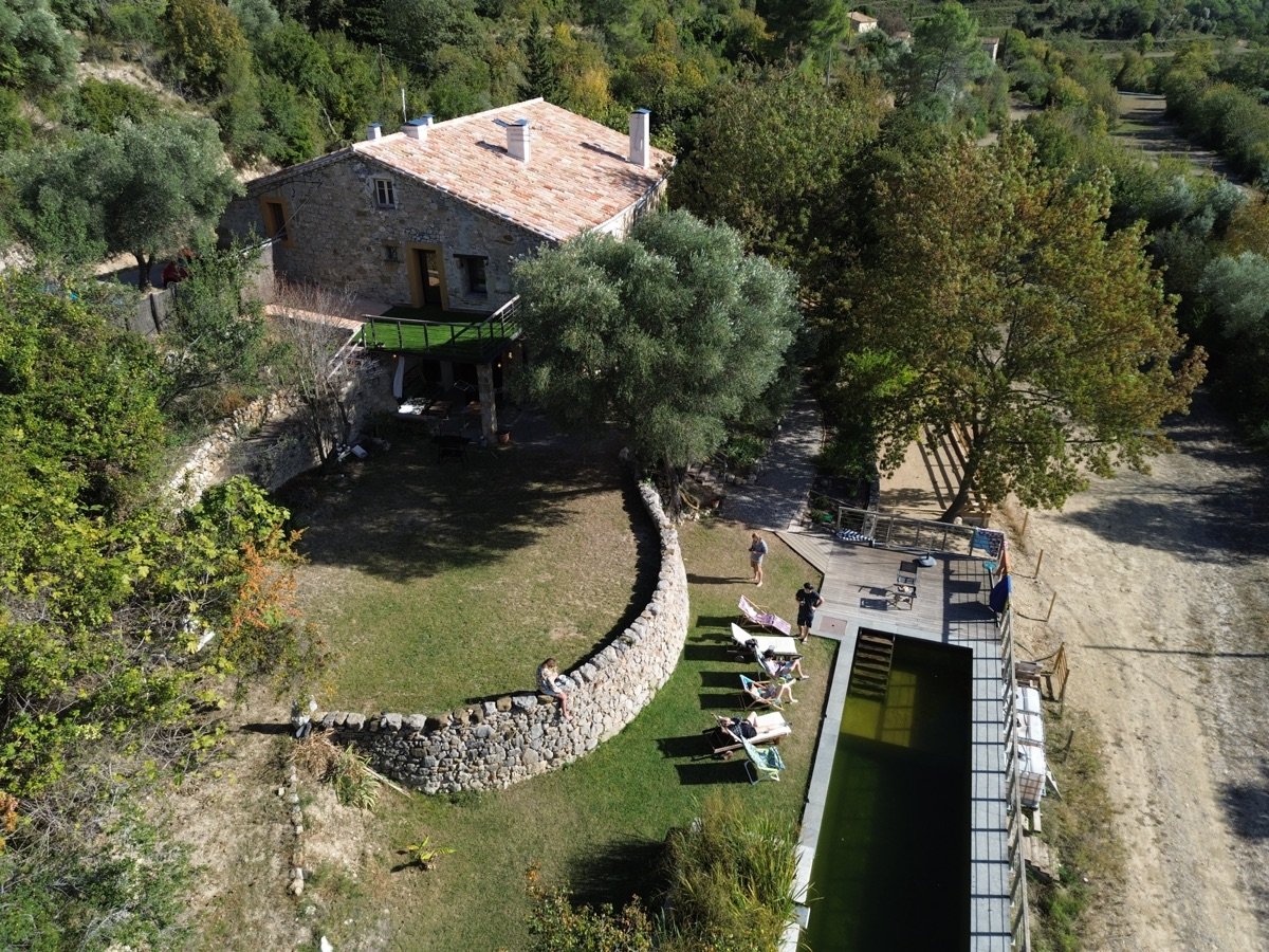 Aerial view of our Catalan masia with natural pool